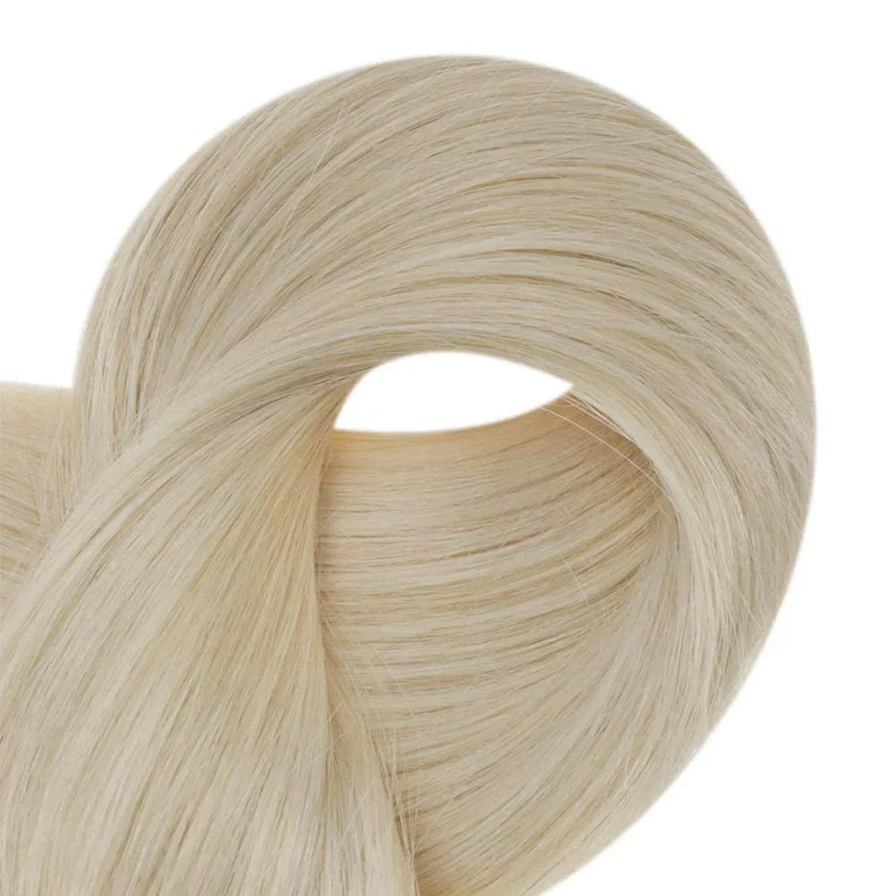 65€ Extensions à clip blond